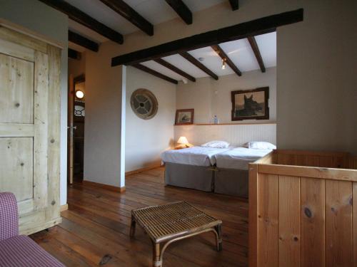 Postel nebo postele na pokoji v ubytování Group Villa with Sauna