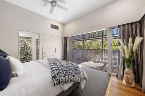 Ένα ή περισσότερα κρεβάτια σε δωμάτιο στο 25 Whitehaven Parade