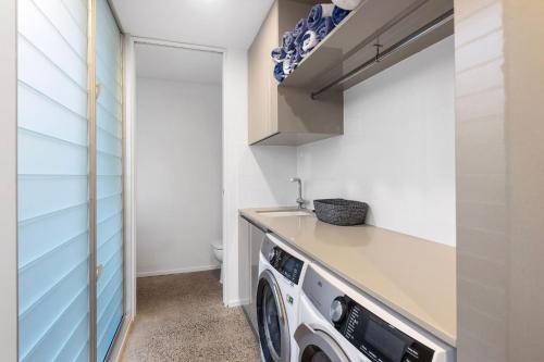 Η κουζίνα ή μικρή κουζίνα στο 25 Whitehaven Parade