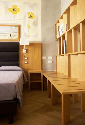 Albergo Giulia Gonzagaにあるベッド