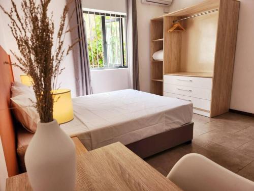 Katil atau katil-katil dalam bilik di La Maison d'Isa