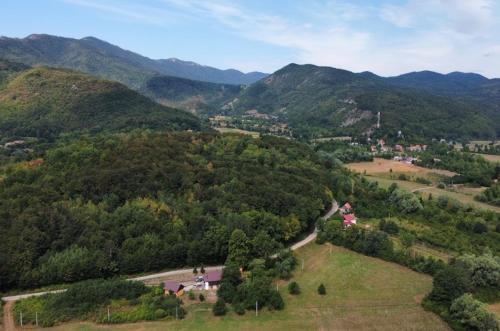 an aerial view of a valley with mountains at Honey house Lika in Gospić