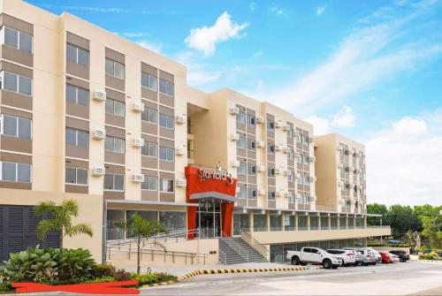 a rendering of the exterior of a hotel at Stanford Suites 3 in Silang
