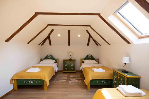 A bed or beds in a room at Due Fratelli Village Resort