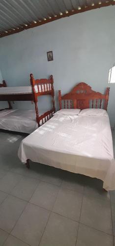Katil atau katil-katil dalam bilik di Casa de Doña Horte