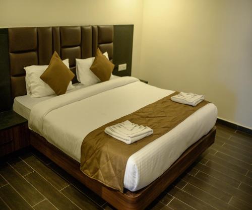 Postel nebo postele na pokoji v ubytování Istana Resort & Spa