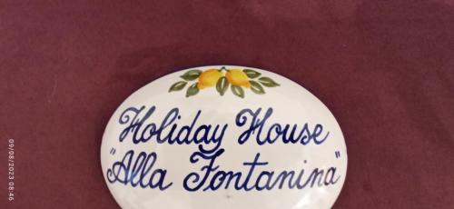a cake with a happy birthday message on it at allafontanina in Minori
