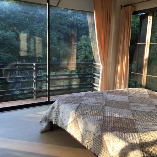 Katil atau katil-katil dalam bilik di Maesa Greenery Hill SHA