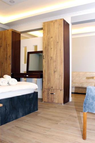 Ένα ή περισσότερα κρεβάτια σε δωμάτιο στο biglife hotel