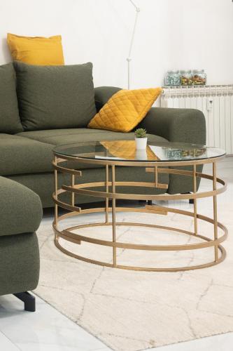 a living room with a couch and a glass coffee table at Apartman 007 in Vukovar