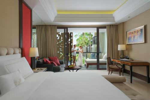 Postel nebo postele na pokoji v ubytování The Trans Resort Bali