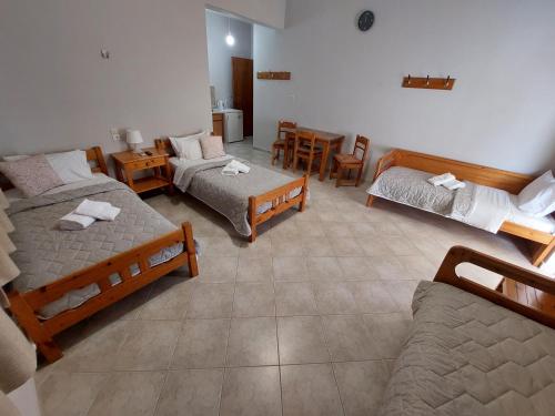 Postel nebo postele na pokoji v ubytování Zagas Hotel Ξενοδοχειο Ζάγκας
