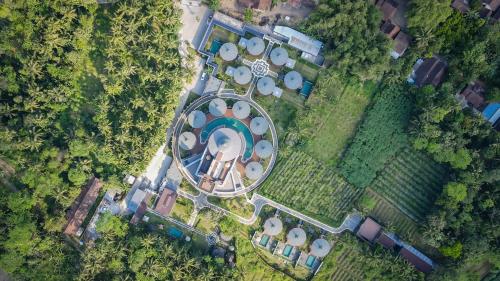 an overhead view of a park with a building at Hotel Le Temple Borobudur in Borobudur