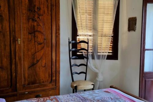 Ένα ή περισσότερα κρεβάτια σε δωμάτιο στο La casa di Elma