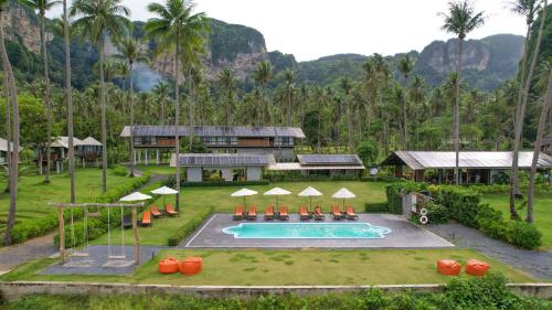 an aerial view of a resort with a swimming pool at Tinidee Hideaway Tonsai Beach Krabi - SHA Extra Plus in Tonsai Beach