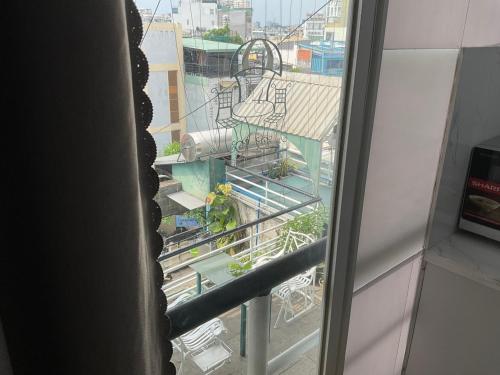 a view from a window of a building with a stairway at Khách sạn Minh Châu - Hòa Hưng in Ho Chi Minh City
