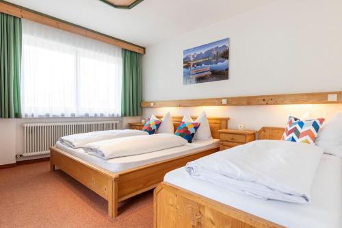 Tempat tidur dalam kamar di Mountain Fresh - alpine easy stay