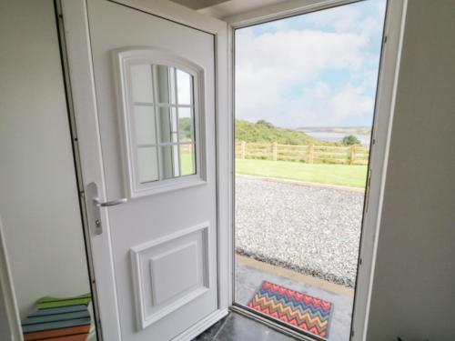 an open door with a view of a yard at The Haven in Falcarragh