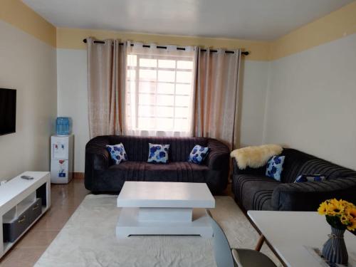 Zona de estar de Grey Homes, 2 bedroom apartments along mombasa road, near JKIA & SGR Nairobi