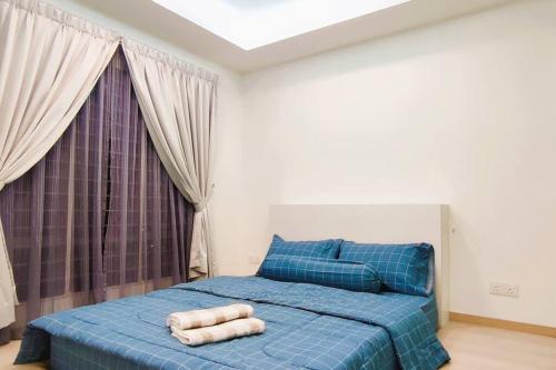 Ένα ή περισσότερα κρεβάτια σε δωμάτιο στο Homey 1BR Studio @ Taman Melawati Town