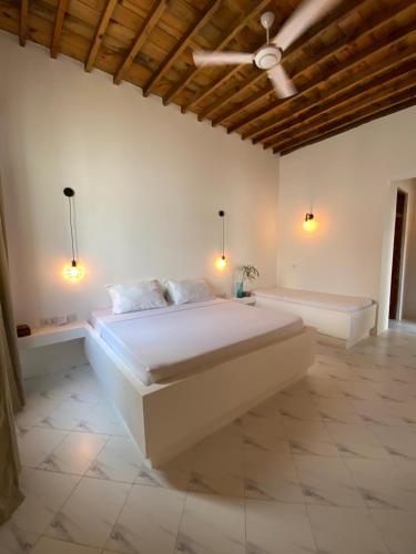 Ένα ή περισσότερα κρεβάτια σε δωμάτιο στο Cactus lodge Zanzibar
