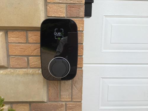 a door opener on the side of a house at Luxury Studio Loft with Car Charging Point in Frizington