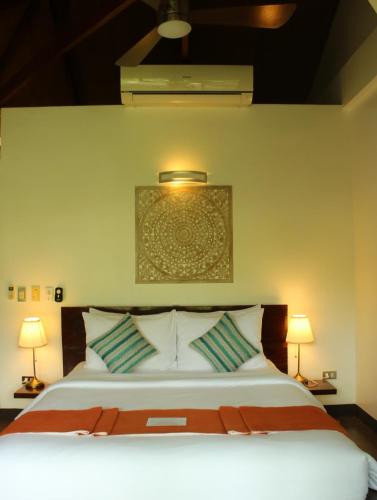 Letto o letti in una camera di Cadlao Resort and Restaurant