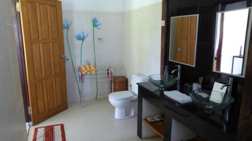 A bathroom at Rumah Kita Villa/hotel