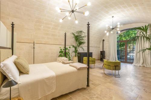Ένα ή περισσότερα κρεβάτια σε δωμάτιο στο Masseria Marchese by Perle di Puglia