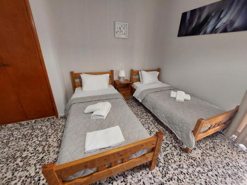 Postel nebo postele na pokoji v ubytování Zagas Hotel Ξενοδοχειο Ζάγκας