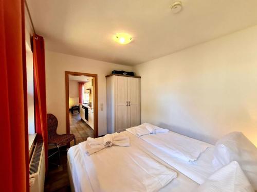 Boddenhus Apartmentにあるベッド