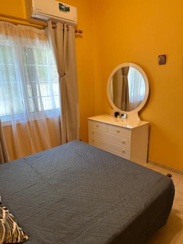 Ένα ή περισσότερα κρεβάτια σε δωμάτιο στο Vergi Apartments