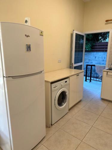 Η κουζίνα ή μικρή κουζίνα στο Vergi Apartments