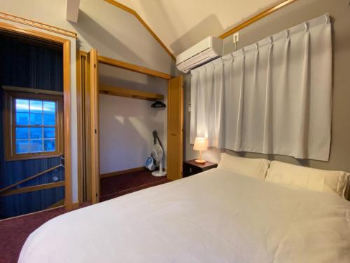 Ein Bett oder Betten in einem Zimmer der Unterkunft Five room 120 SKY TREE SENSOJI FreeParking 1292sqft