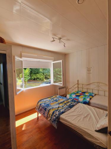 Postel nebo postele na pokoji v ubytování Maison proche lacs et océans