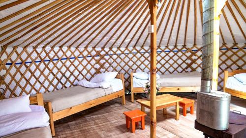 Postel nebo postele na pokoji v ubytování Khun Odod Resort, Khuvsgul province Mongolia