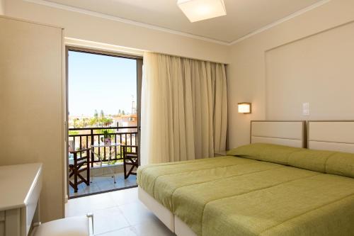 Katil atau katil-katil dalam bilik di Trefon Hotel Apartments and Family Suites