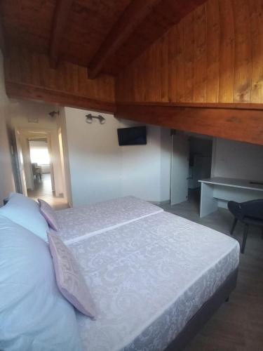 Postel nebo postele na pokoji v ubytování Il Riccio home & relax