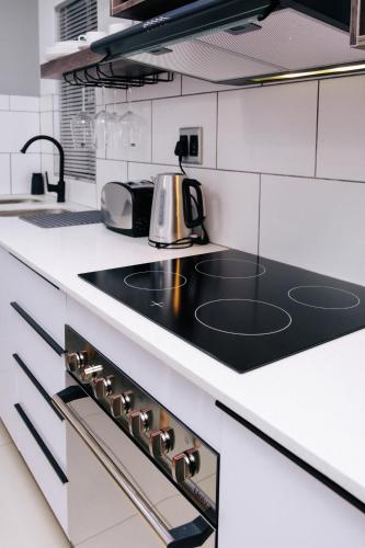 Cucina o angolo cottura di The Lofts Luxury Suites
