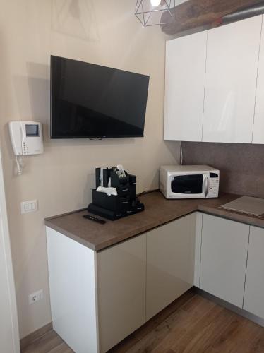 Kuchyň nebo kuchyňský kout v ubytování Monolocale Lucca PellegriniLittleHouse
