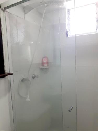 a shower with a glass door in a bathroom at Apartamento centro MDE in Medellín