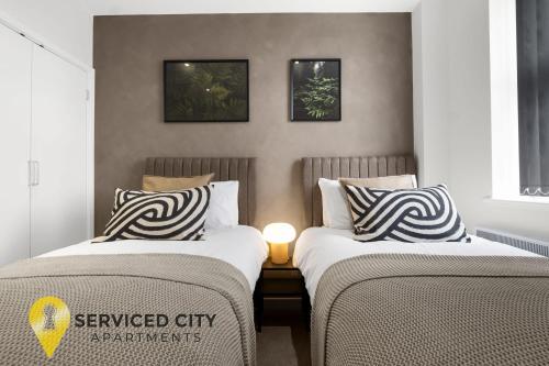 Krevet ili kreveti u jedinici u okviru objekta SCA- Arden Apartment 4 Twin Bedroom Free Parking
