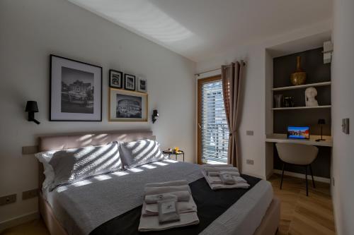 Posteľ alebo postele v izbe v ubytovaní Luxury Trastevere gym & rooftop 5H