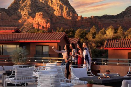 a group of women standing on the roof of a resort at The Wilde Resort and Spa in Sedona