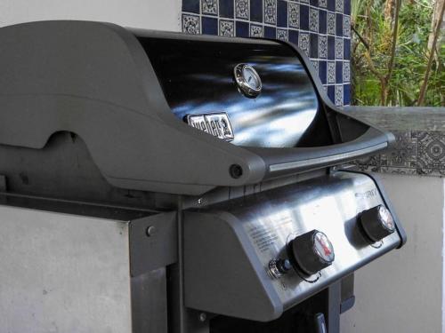a close up of the back of a motorcycle at Aku-Chic Newly furbished condo Jungle pool in Xetna
