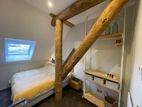 Ein Bett oder Betten in einem Zimmer der Unterkunft Klein Nienoord Midwolde