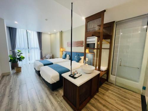 Ένα ή περισσότερα κρεβάτια σε δωμάτιο στο The Light Hotel