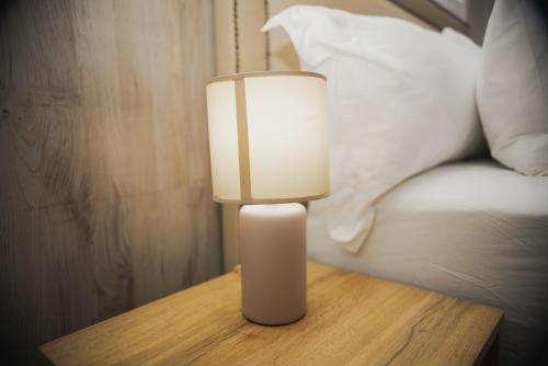 Letto o letti in una camera di The Lofts Luxury Suites