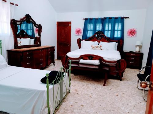 Postel nebo postele na pokoji v ubytování CerroAly