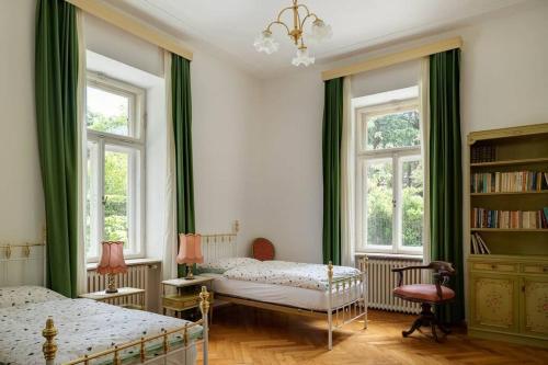 En eller flere senge i et værelse på Apartment Anna